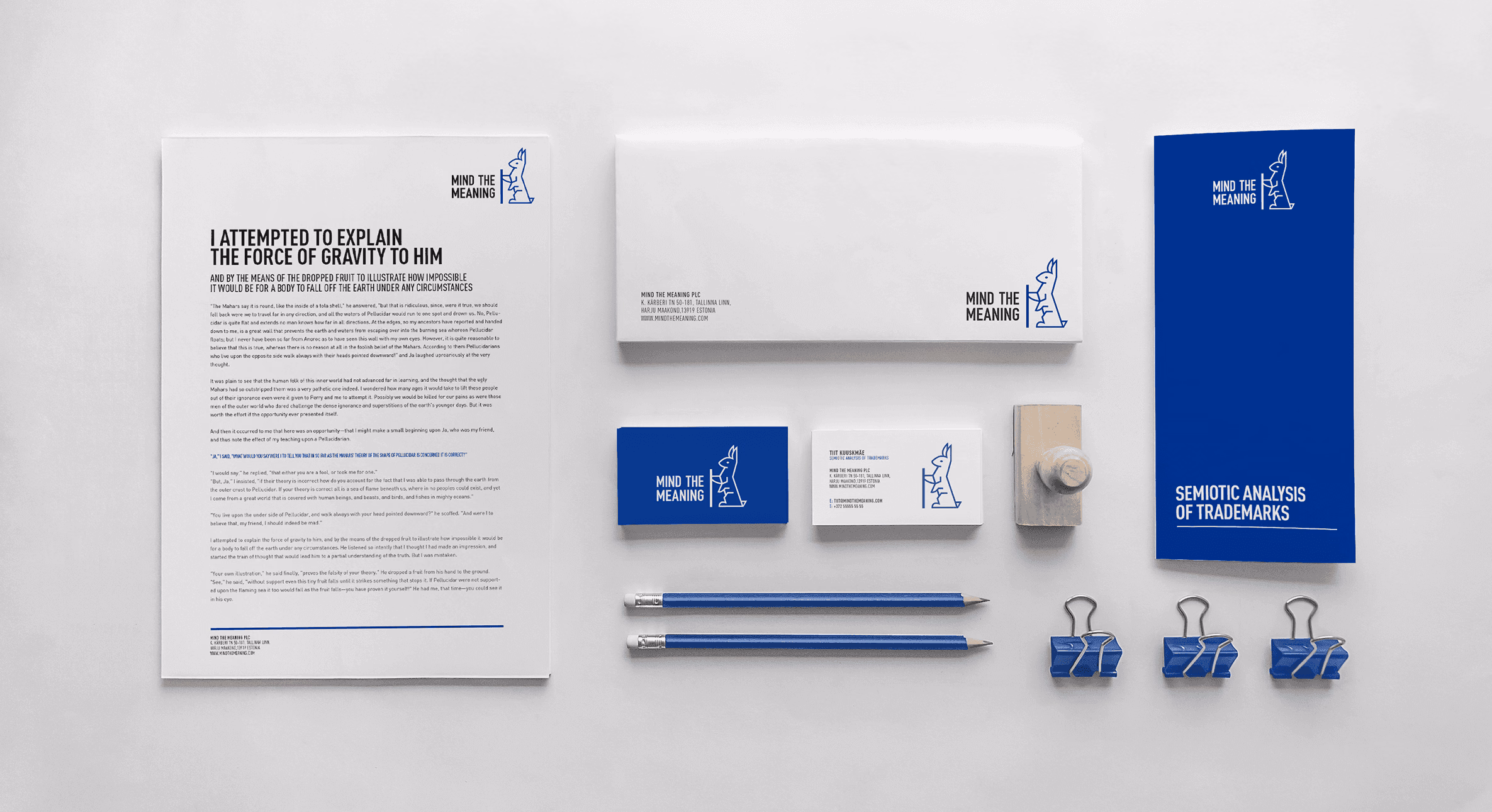 Branded letterhead, envelopes, business cards, pencils, and brochure.